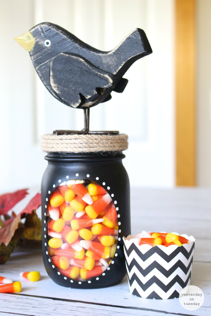 Fall Painted Mason Jar with Crow Topper - Candy Corn Craft Ideas - Mason Jar Craft Ideas for Fall - Mason Jar Craft Ideas for Halloween.