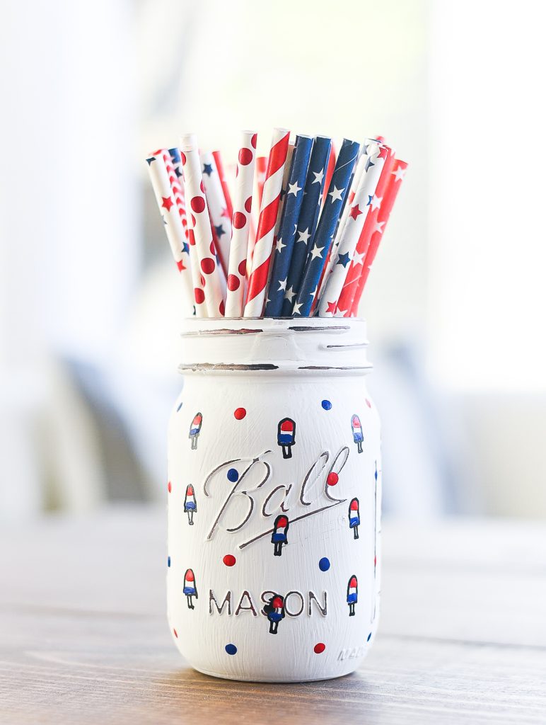 Red, White & Blue Popsicle mason jar. Patriotic mason jar craft. Memorial Day craft idea with jars. Fourth of July craft ideas with jars.
