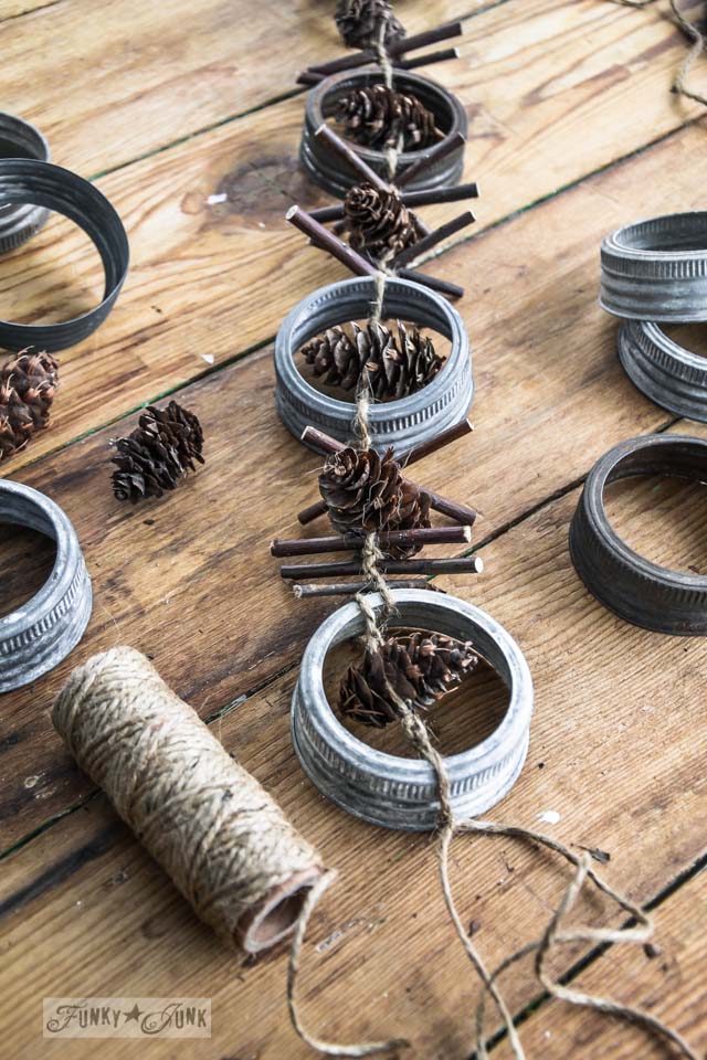 Masson Jar Lid Rustic Garland for Christmas Tree. Unique Christmas Crafts with Mason Jars and Lids. Mason Jar Holiday Craft Ideas. Mason Jar Lid Winter Craft Ideas. Mason Jar Lid Wreaths. Mason Jar Lid Snowman.