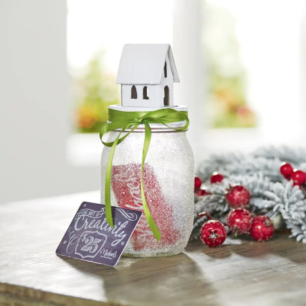 Vintage House topped Mason Jar Gift Card Holder from Michael's. Mason Jar Holiday Gift Card Holders. Mason Jar Christmas Gift Card Holder Ideas. Creative ways to Package Gift Cards in Mason Jars.