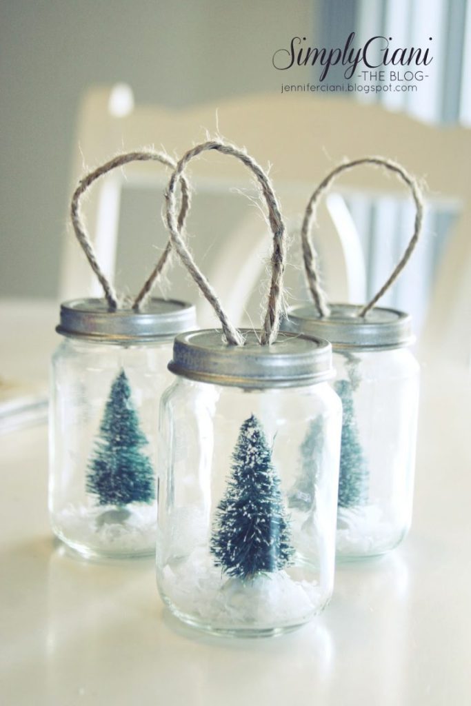 Mini Mason Jar Snow Globe Ornament with Bottle Brush Trees. Mason Jar Christmas Ornament Craft Ideas. DIY Mason Jar Ornaments - Christmas Crafts with Mason Jars - Homemade Ornament Craft Ideas. Mini Mason Jar Ornaments tutorial. Mason Jar Lid Ornaments. Mason Jar Lid Mini Wreath Ornaments.