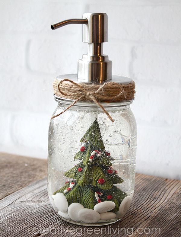 Snow Globe Mason Jar Soap Dispenser. How to Make a Snow Globe Soap Dispenser. Mason Jar Snow Globe Craft Ideas. Bottle Brush Trees in Mason Jar Snow Globes. How to Make a Snow Globe in a Jar. Kids Craft Ideas for Christmas with Mason Jars. Gift Ideas in Mason Jars. Winter Crafts Ideas with Snow Globes. Mason Jar Crafts for Christmas. 