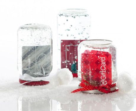 Easy Mason Jar Snow Globe Gift Card Holders. Mason Jar Snow Globe Craft Ideas. Bottle Brush Trees in Mason Jar Snow Globes. How to Make a Snow Globe in a Jar. Kids Craft Ideas for Christmas with Mason Jars. Gift Ideas in Mason Jars. Winter Crafts Ideas with Snow Globes. Mason Jar Crafts for Christmas. 