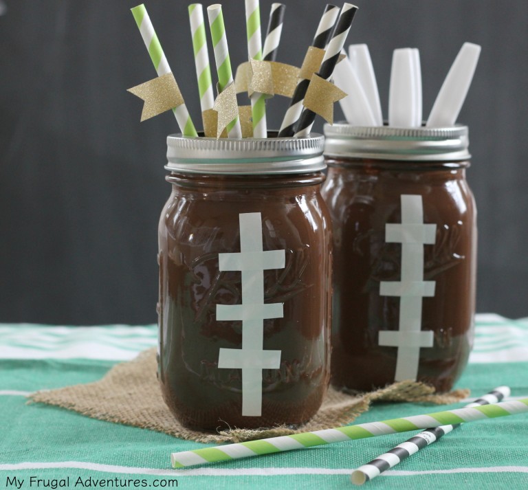 Football Mason Jar Crafts & Party Ideas. Football Party with Mason Jars. Mason Jar Football Centerpiece. Mason jar football drink cups. Mason jar football utensil holder.
