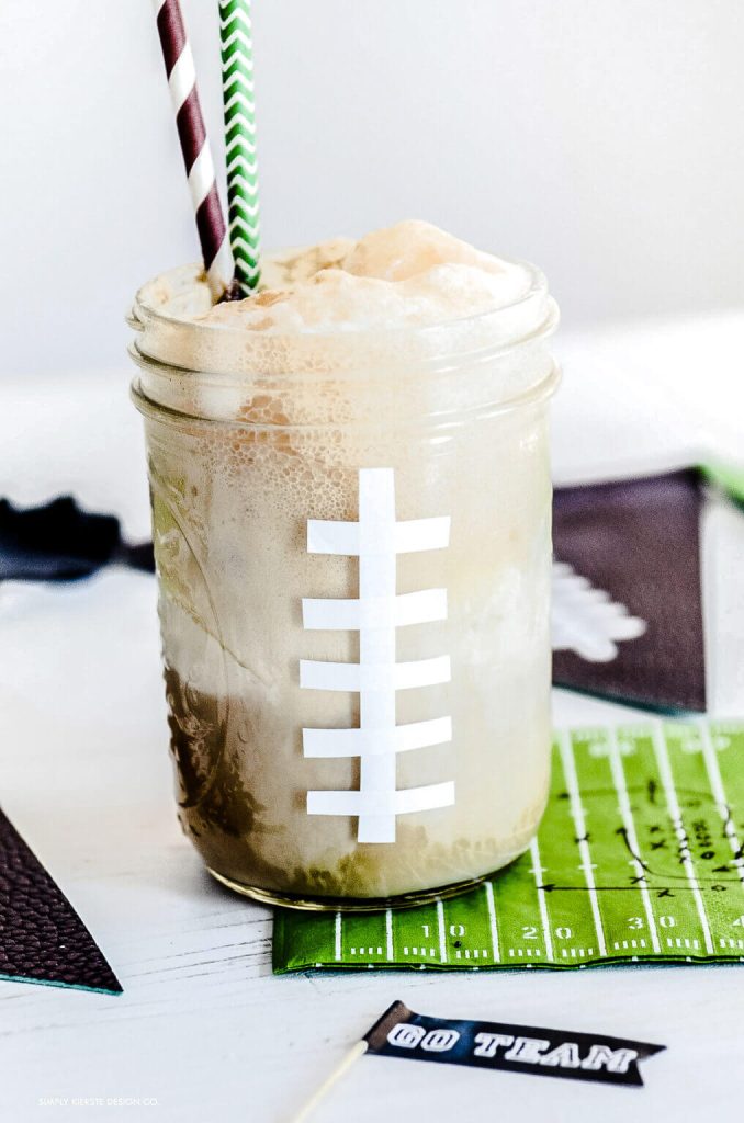 Football Root Beer Float for Party Idea. Football Mason Jar Crafts & Party Ideas. Football Party with Mason Jars. Mason Jar Football Centerpiece. Mason jar football drink cups. Mason jar football utensil holder.