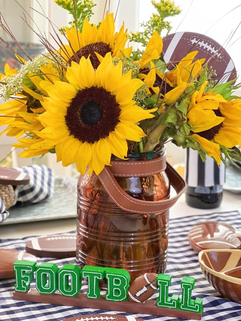 Mason Jar Football Party Centerpiece. Football Mason Jar Crafts & Party Ideas. Football Party with Mason Jars. Mason Jar Football Centerpiece. Mason jar football drink cups. Mason jar football utensil holder.