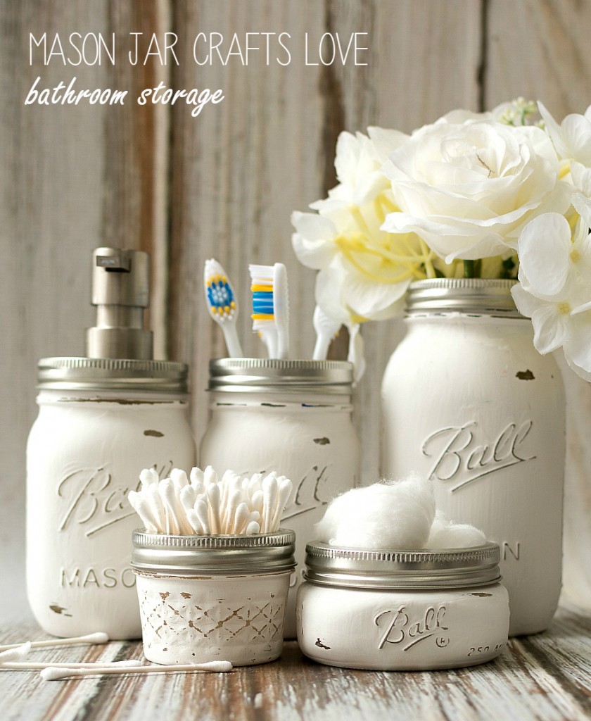 Chalked Painted and Distressed Mason Jar Bathroom Storage Jars. Mason Jar Bathroom Storage and Organization Ideas. Organizing the bathroom with mason jars. Pretty storage ideas with mason jars. Rustic storage ideas with mason jars. Bathroom storage using mason jars.