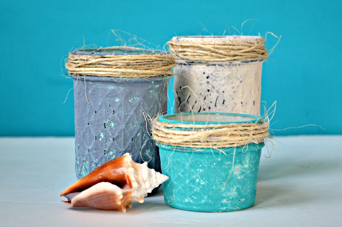Beachy Painted Mason Jars. Blue and White Painted Mason Jars. Summer Mason Jar Crafts. Kid's Craft for Summer with Mason Jars. Coastal Mason Jar Ideas. Painted Mason Jars for Summer. Mason Jar Planters. Twine Wrapped Mason Jar Crafts. Firefly Mason Jars. Mason Jar Votives for Summer.