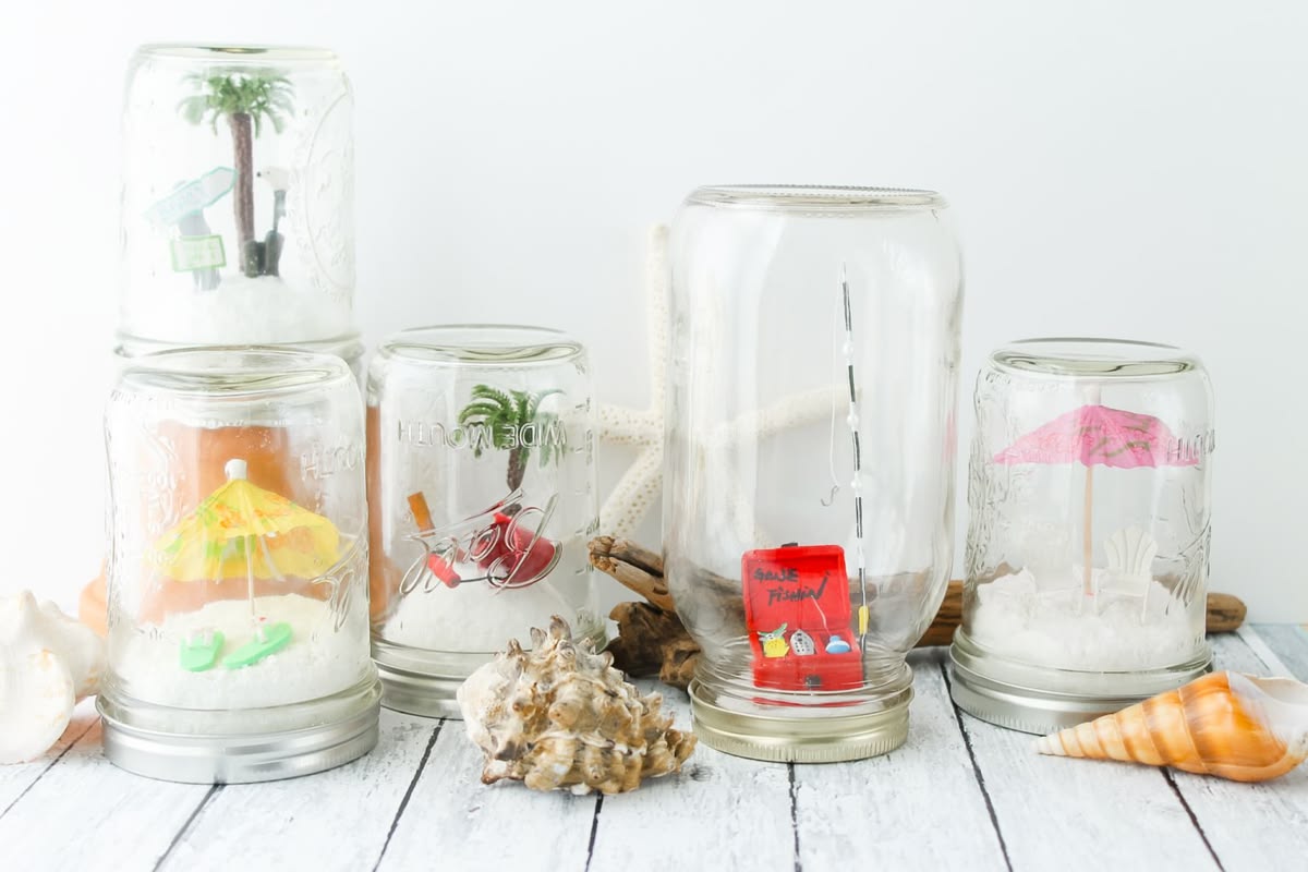 Beach Mason Jar Terrarium. Summer Mason Jar Crafts. Kid's Craft for Summer with Mason Jars. Coastal Mason Jar Ideas. Painted Mason Jars for Summer. Mason Jar Planters. Twine Wrapped Mason Jar Crafts. Firefly Mason Jars. Mason Jar Votives for Summer.