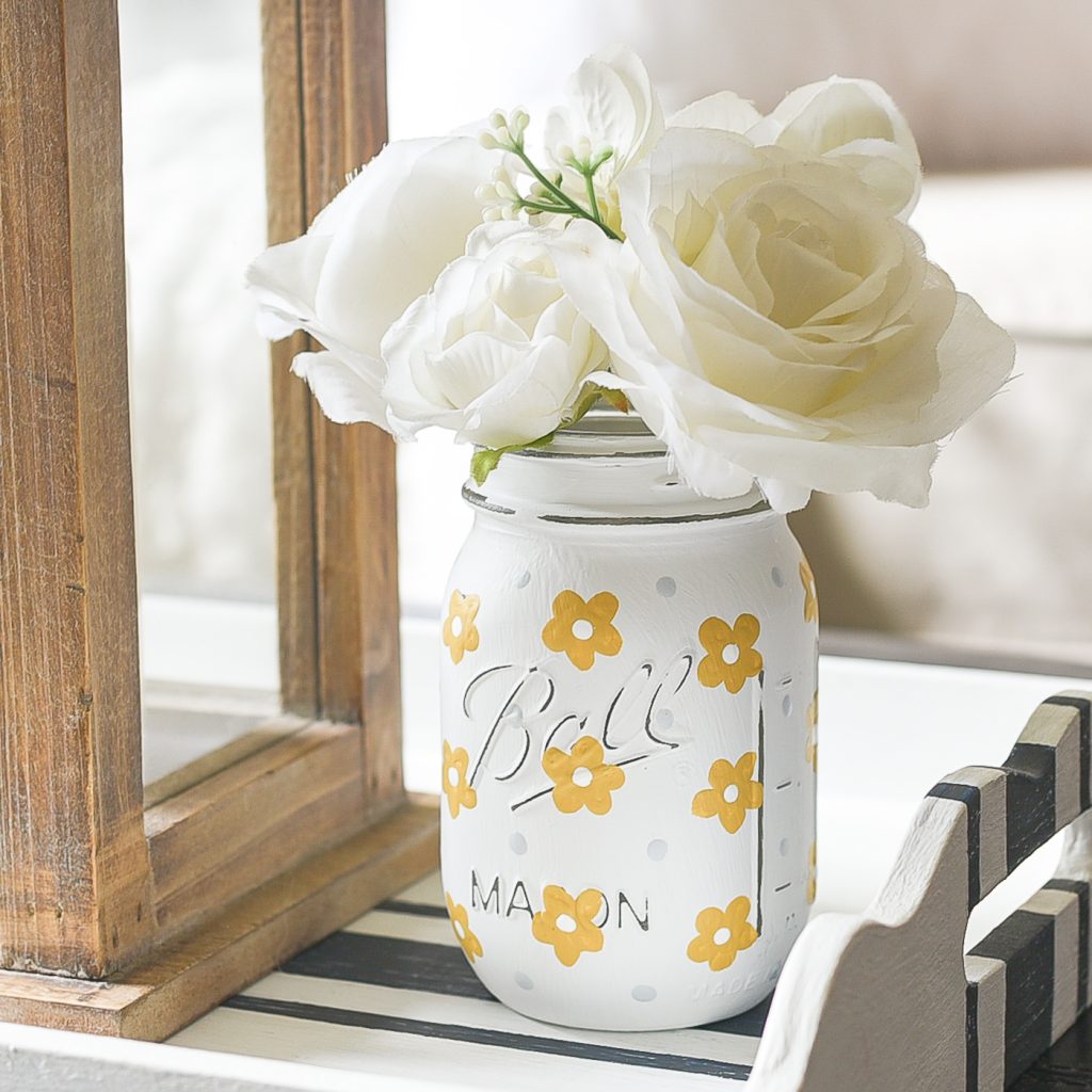 Yellow Daisies Painted on Mason Jars. Summer Mason Jar Crafts. Kid's Craft for Summer with Mason Jars. Coastal Mason Jar Ideas. Painted Mason Jars for Summer. Mason Jar Planters. Twine Wrapped Mason Jar Crafts. Firefly Mason Jars. Mason Jar Votives for Summer.