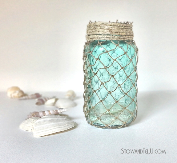 Fisherman Netting Wrapped Mason Jar. Summer Mason Jar Crafts. Kid's Craft for Summer with Mason Jars. Coastal Mason Jar Ideas. Painted Mason Jars for Summer. Mason Jar Planters. Twine Wrapped Mason Jar Crafts. Firefly Mason Jars. Mason Jar Votives for Summer.