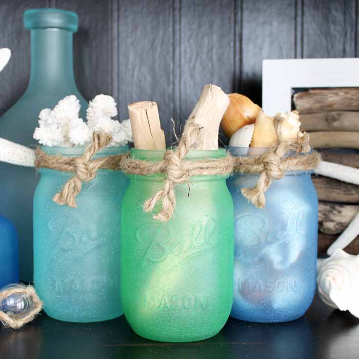 Sea Glass Painted Mason Jar Craft. Summer Mason Jar Crafts. Kid's Craft for Summer with Mason Jars. Coastal Mason Jar Ideas. Painted Mason Jars for Summer. Mason Jar Planters. Twine Wrapped Mason Jar Crafts. Firefly Mason Jars. Mason Jar Votives for Summer.