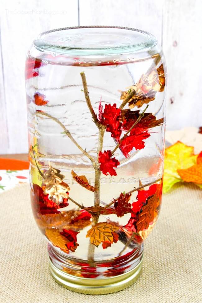 Fall Leaves Snow Globe. Mason Jar Crafts for Fall. 30+ Craft Idea for Autumn. Crafts for Fall with Mason Jars. Mason Jar Autumn Crafts. Painted Mason Jars for Fall. Mason Jar Votives for Fall. Pumpkin Mason Jar Crafts for Fall.