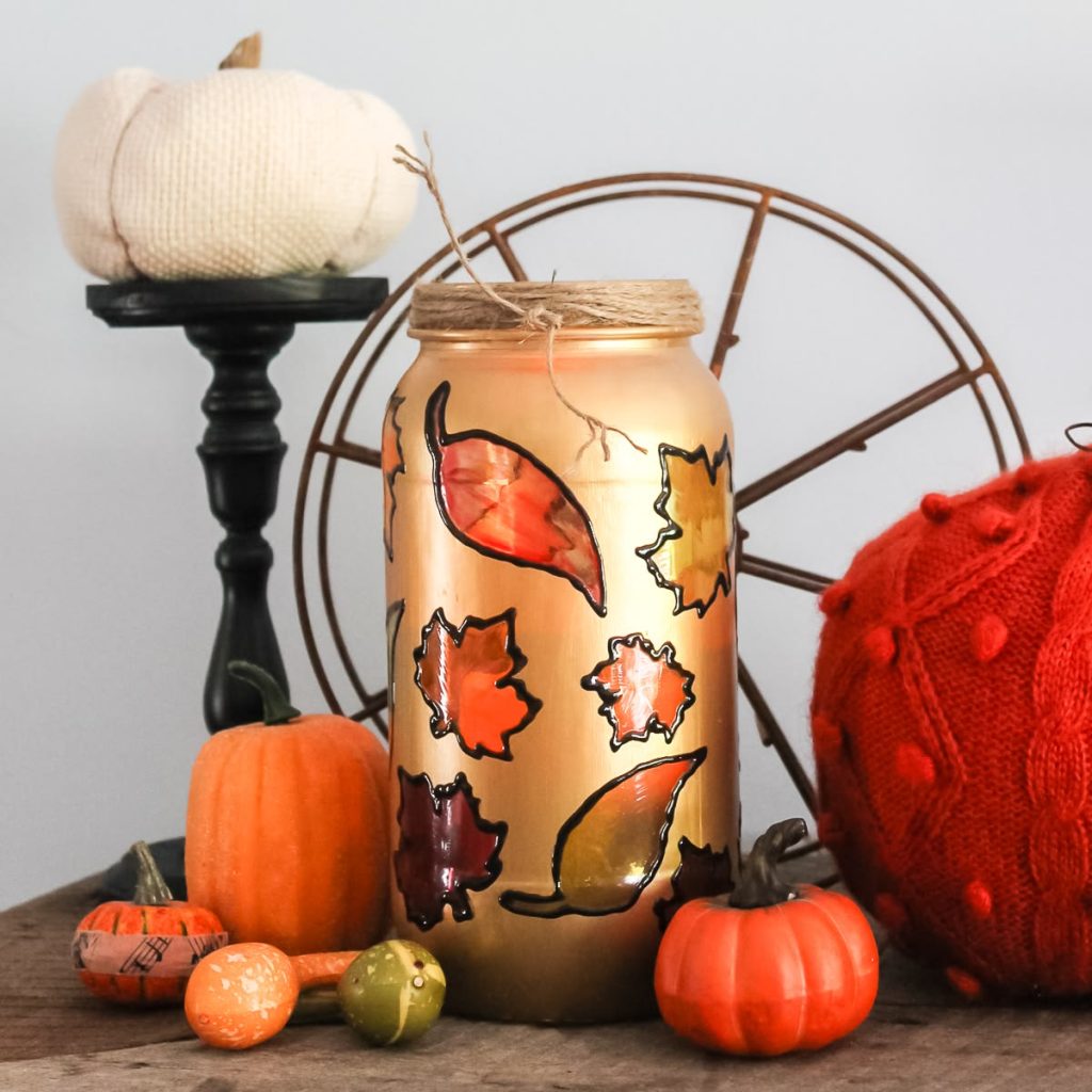 Fall Stain Glass Leaves on Mason Jar Candle. Mason Jar Crafts for Fall. 30+ Craft Idea for Autumn. Crafts for Fall with Mason Jars. Mason Jar Autumn Crafts. Painted Mason Jars for Fall. Mason Jar Votives for Fall. Pumpkin Mason Jar Crafts for Fall.
