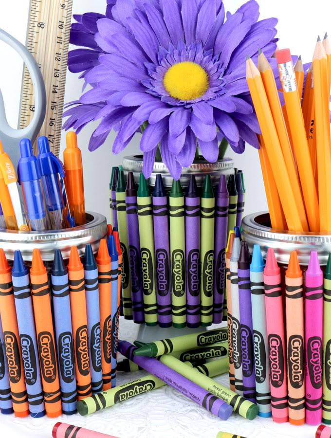 Crayon Wrapped Mason Jars for Back to School, Pencil and Pen Holders from Mason Jars. Mason Jar Craft Ideas for Back to School, Teacher Gift Mason Jars - Mason Jar Gift Ideas for Teachers - School Themed Mason Jars. Mason Jar Pencil Holders Themed for School, Students, Teachers. Back to School Teacher Gift Ideas. Holiday Teacher Gift Ideas with Mason Jars. DIY Teacher Gift Ideas.
