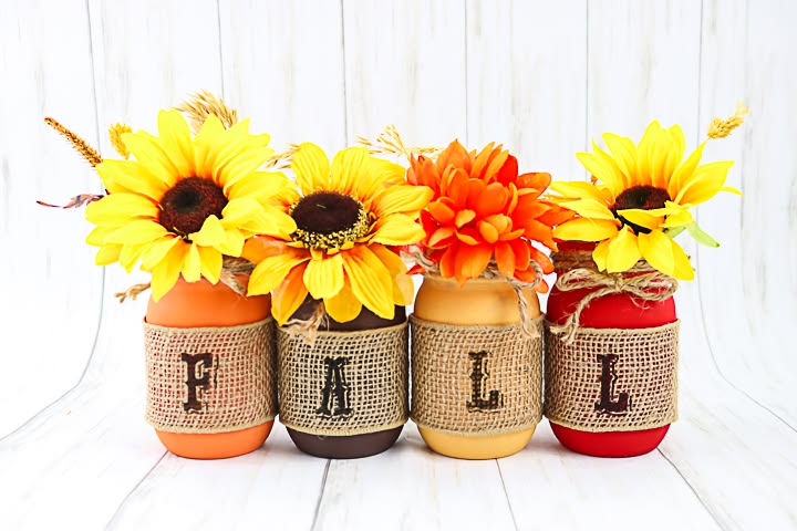Burlap Wrapped Fall Mason Jar Centerpiece. Mason Jar Crafts for Fall. 30+ Craft Idea for Autumn. Crafts for Fall with Mason Jars. Mason Jar Autumn Crafts. Painted Mason Jars for Fall. Mason Jar Votives for Fall. Pumpkin Mason Jar Crafts for Fall.